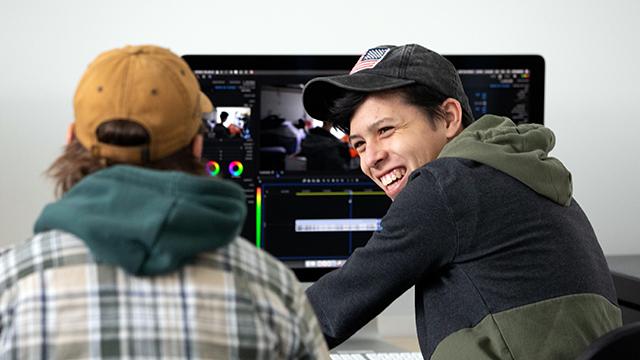 Two students working at a computer