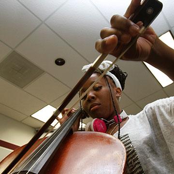 A violinist concentrating during performance